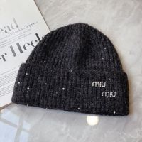 Miu Miu Knitted Hat With Strass Logo Patch In Wool Black